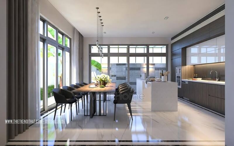 Trang trí nội thất phòng ăn hiện đại nhưng đẹp thông thoáng bởi ý tưởng tạo nên không gian mở từ hệ cửa kính rộng, lớn. thiết kế biệt thự