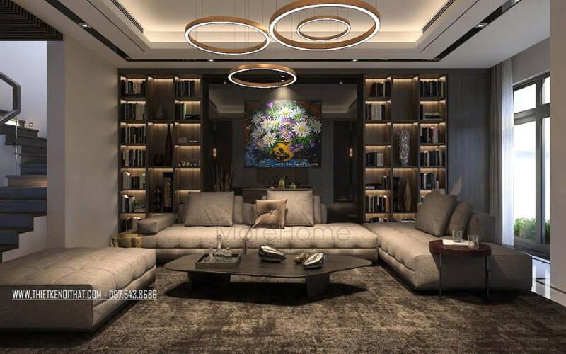 Sắp xếp nội thất phòng khách hiện đại, đẹp với bộ bàn ghế sofa lớn, kệ ốp tường, tranh treo tường. Thiết kế biệt thự