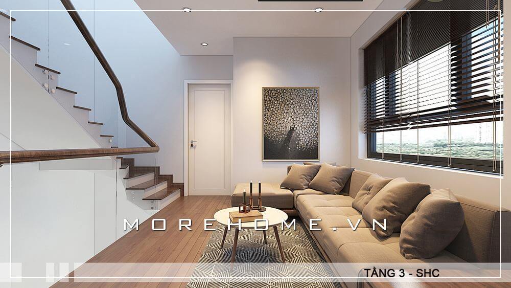 Mẫu thiết kế phòng khách nhỏ gọn, hiện đại cạnh cầu thang tầng 3 với chiếc ghế sofa chữ L bọc nỉ đẹp mang đến không gian thư giãn lí tưởng cho các thành viên trong gia đình Thiết kế biệt thự