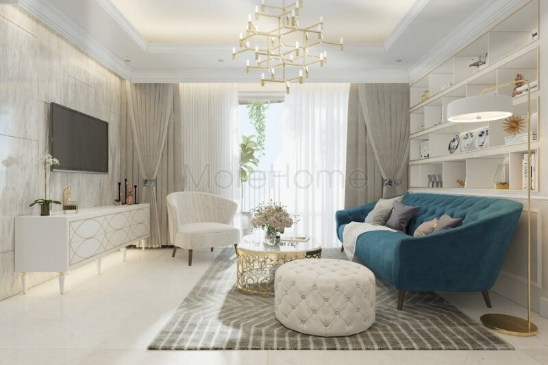 Bộ sofa đẹp bọc nỉ màu xanh ấn tượng được coi là điểm nhấn sang trọng, tạo sự tươi mới cho không gian phòng khách của gia chủ Mẫu nội thất biệt thự tân cổ điển đẹp