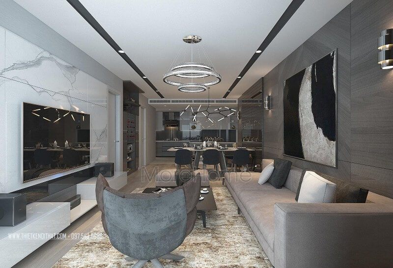Kệ tivi hiện đại gỗ công nghiệp acrylic bóng gương càng làm cho không gian phòng khách chung cư hiện đại 2 phòng ngủ thêm cuốn hút và sang trọng.